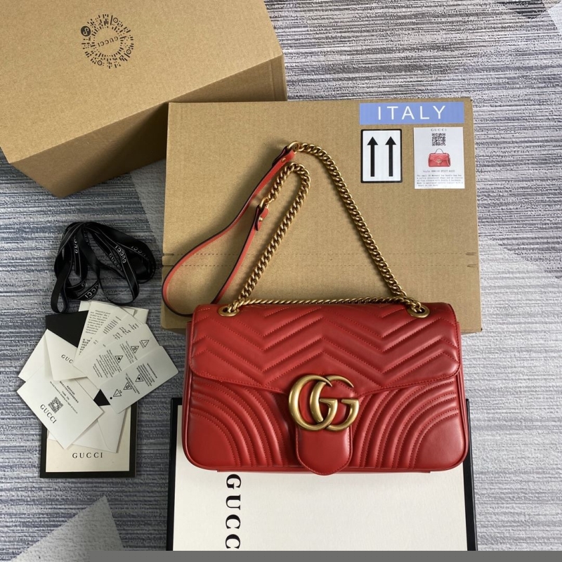 G*u*i top handle bags